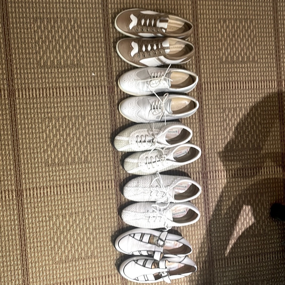 5 pairs of designer golf shoes